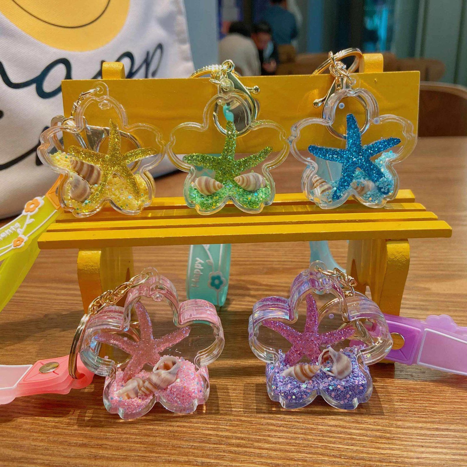 Cute Cartoon Liquid Acrylic Plastic Keychain Baby Doll Key Chain 3d Doll Bag Pendant Keyrings Wholesale