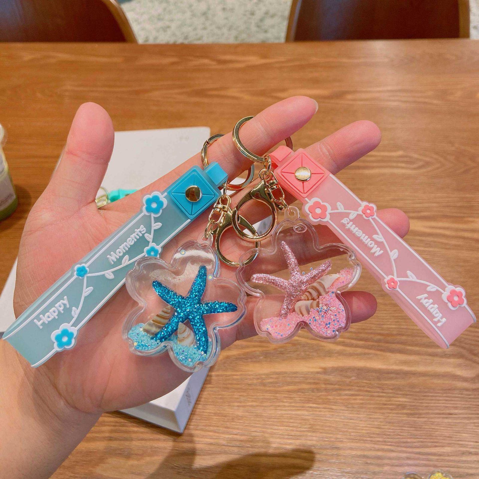 Cute Cartoon Liquid Acrylic Plastic Keychain Baby Doll Key Chain 3d Doll Bag Pendant Keyrings Wholesale
