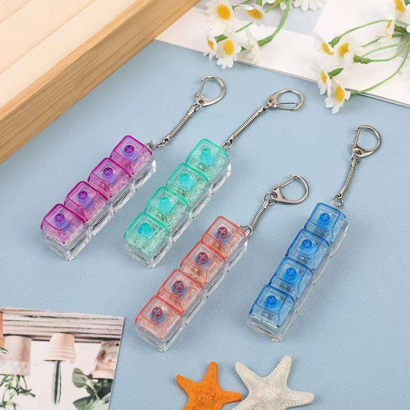 Novacross Plastic Squeezable Stress Relieving Toy Mechanical Keyboard Switch Creative Key Chain with Led Light Unisex