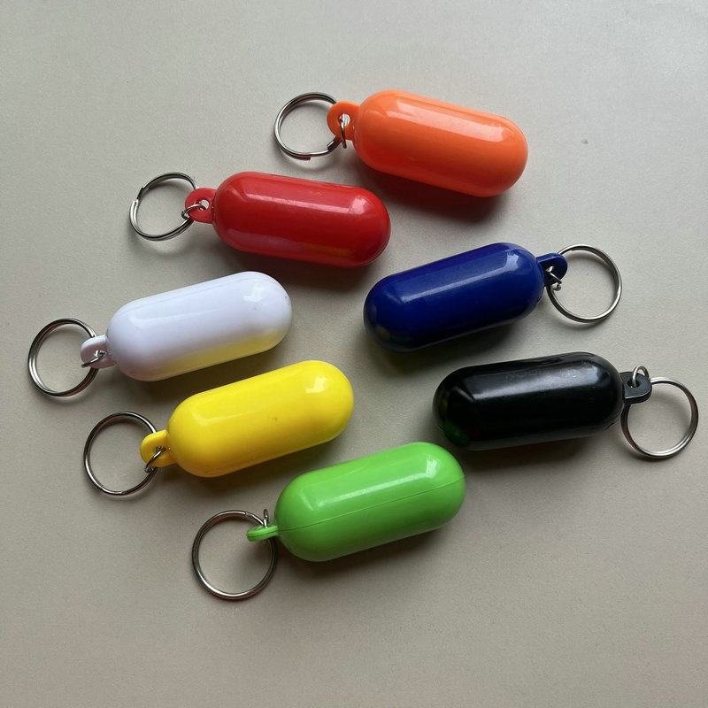 Custom Logo Floating Plastic Eco-friendly Key Ring Capsule Style Cylindrical Buoyant Keychain Swimming Pool Marine Sailing Boat