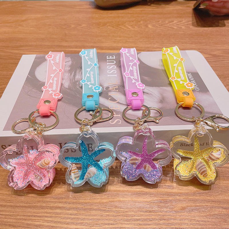 Cute Cartoon Liquid Acrylic Plastic Keychain Baby Doll Key Chain 3d Doll Bag Pendant Keyrings Wholesale